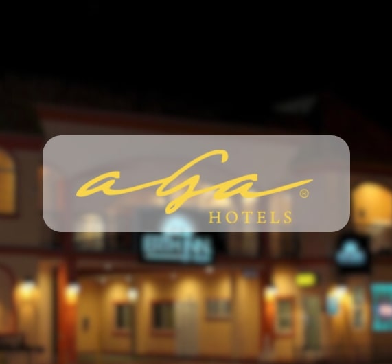 AGA Hotels - Website slider image - Erth Inn as background with log