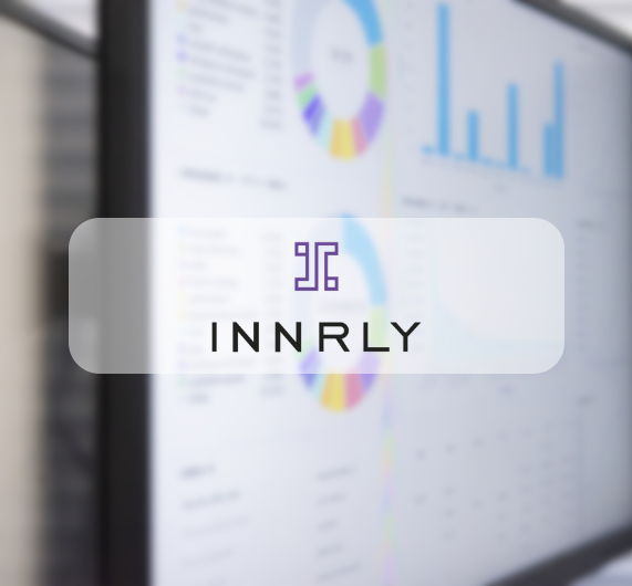 Innrly logo with an image of data charts in background