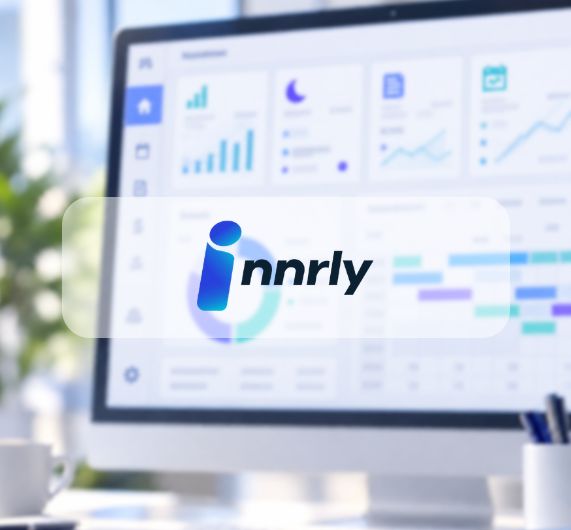 Innrly logo with data analytics show in background in graphs on a computer