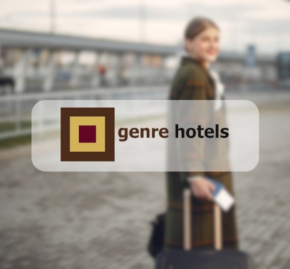 Genre Hotels logo for website with business traveler in background
