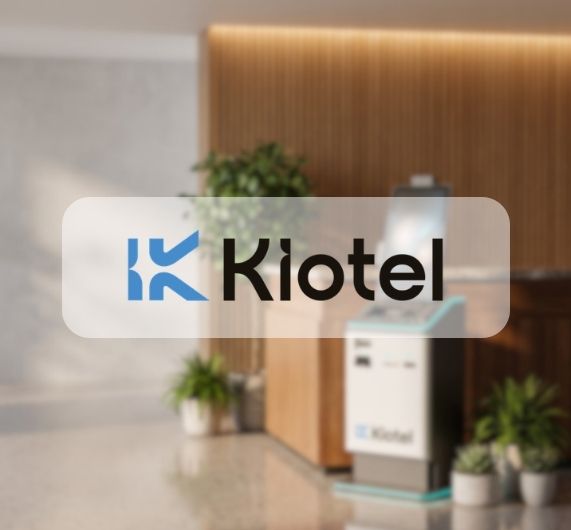 Kiotel logo over an image of kiosk in a hotel