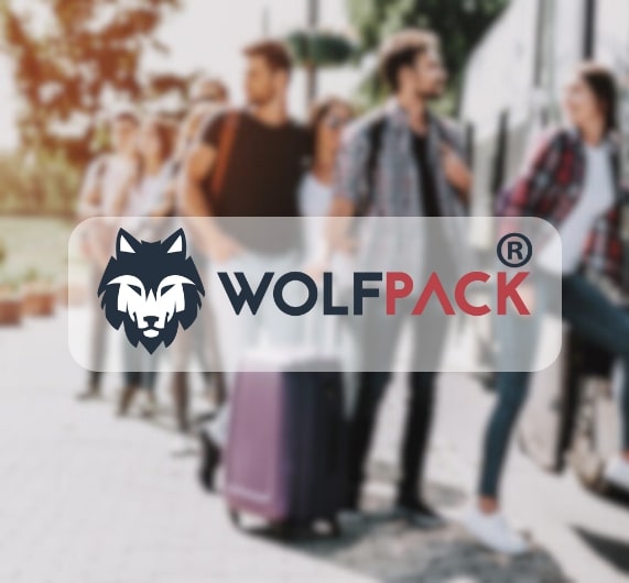 WolfPack logo with image of bus tour background