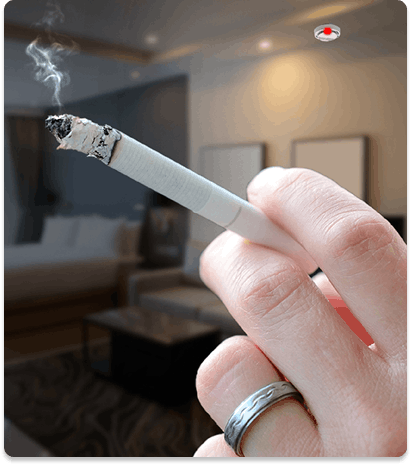 image of hand with cigarette in a hotel room